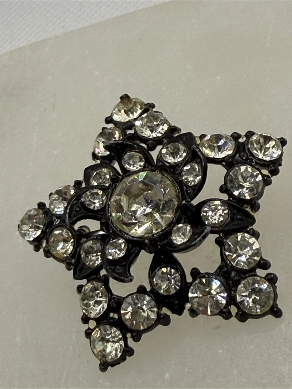 Vintage Starburst  Star rhinestone Pin Brooch - Black Metal unusual piece